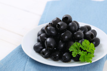 black olives with parsley