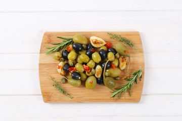 pickled olives, capers, caper berries and garlic