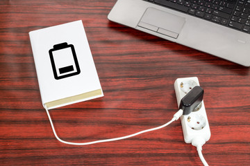 Book charging on a desk