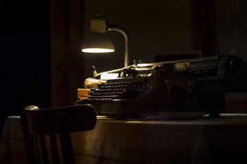 old typewriter at night with low light