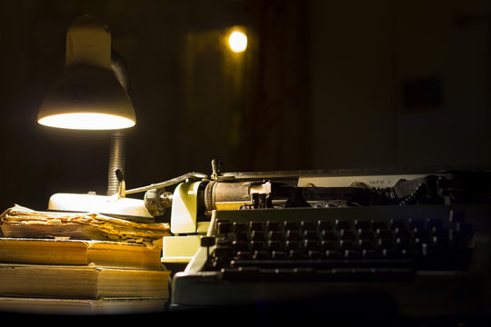old typewriter at night with low light