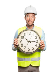 Confident engineer against white background