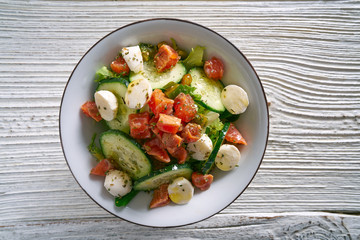 Salmon salad of mozzarella tomato cucumber