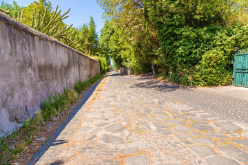 Rome, Italy. Appian road (Via Appia Antica) in sunny weather in summer, 312 BC