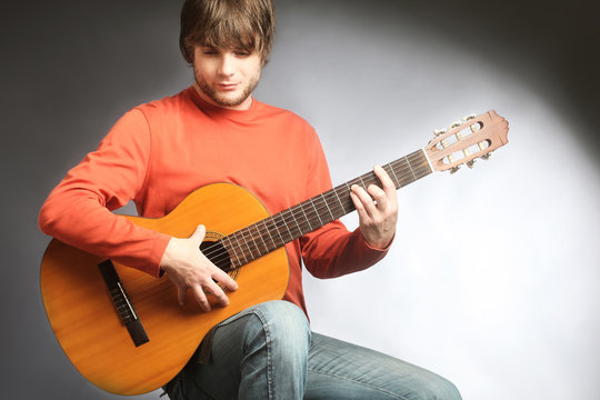 Acoustic guitar player Guitarist playing spanish guitar