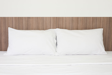 Fototapeta na wymiar White pillows on a bed