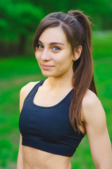 Portrait of a sports girl in the park