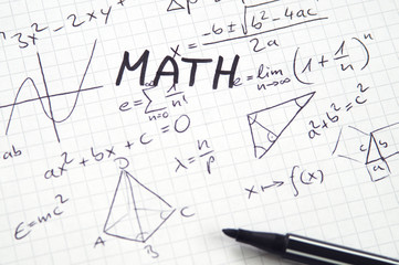 Word Math in handwriting on checkered paper with misc algebra notes, felt-tip pen