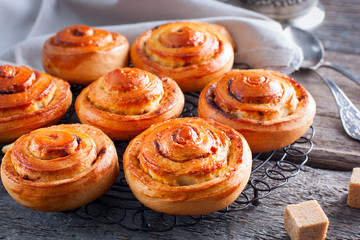 Fresh homemade sweet rolls with cinnamon, horizontal