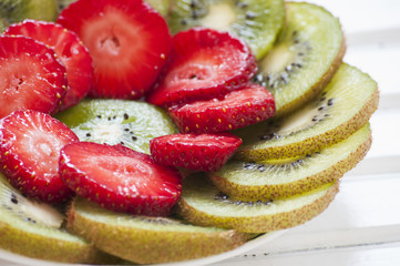 Kiwi Fruit and Strawberries on White