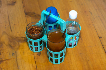 Thai seasoning contain with fish sauce, cayenne, chilies in vinegar,  and sugar.