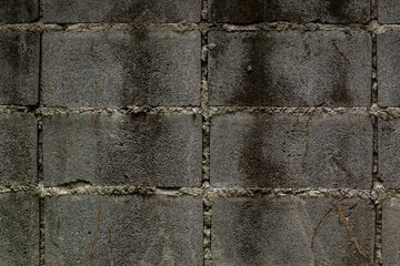 Texture of dirt wall bricks with many stain