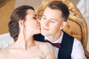 wedding couple on the studio. Wedding day. Happy young bride and groom on their wedding day. Wedding couple - new family.