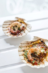 baked king prawns in spicy tomato and herb sauce