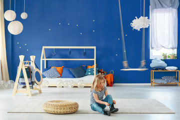 Girl bedroom with blue wall