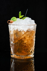 Original Cocktail with mint and cinnamon, whiskey with ice