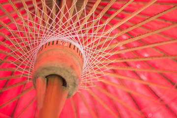 Colorful umbrellas background;red umbrells soft focus