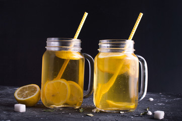 Lemonade on a wooden background