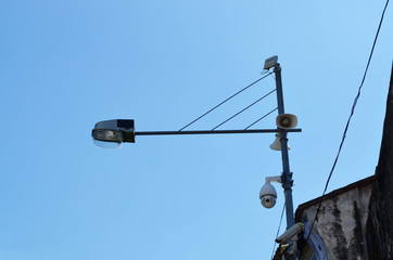 Loudspeaker and CCTV camera on lamp post