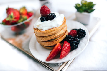 Pancakes on plate. Breakfast in bed 

