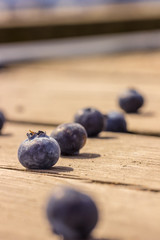 Fototapeta na wymiar Blueberry on table in sun