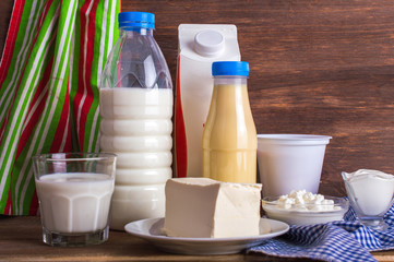Dairy products on a wooden background