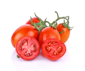Tomatoes. Whole and a half isolated on white
