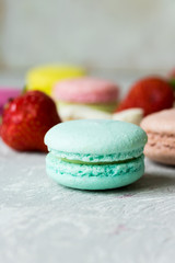 Mint macaroni on the background of other macaroons