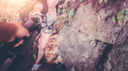 Male and woman couples asia. Walking hand travelers travel nature Forests. the route walk in the forest