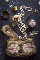 Vintage women's things on a wooden background