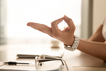 Female palm with fingers folded in Jnana mudra gesture from eastern spiritual practices....