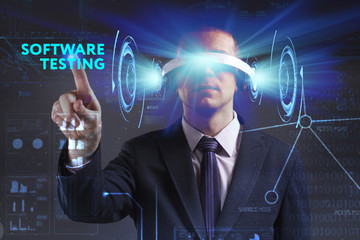 Business, Technology, Internet and network concept. Young businessman working in virtual reality glasses sees the inscription: Software testing