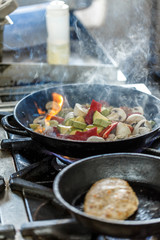 Chef is cooking vegetables