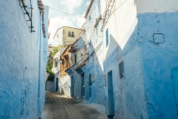 Vibrant blue coloured buildings. Chefchaouen street in Morocco, Africa