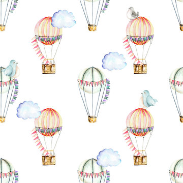 Seamless pattern with watercolor festive air balloons, clouds and cute birds, hand drawn isolated on a white background