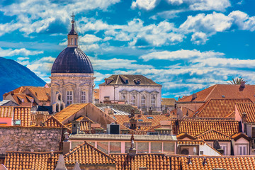 Fototapeta na wymiar Dubrovnik aerial rooftops. / Scenic aerial view on rooftops in historic town Dubrovnik, famous european travel resort on Mediterranean Coast, Croatia. 