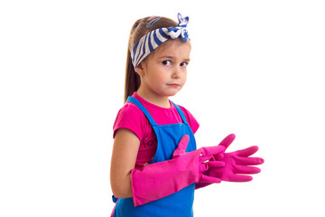 Girl in apron and gloves
