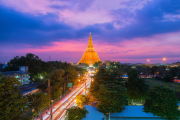 Aerial view of Large golden pagoda in Thailand at sunset, Located in the community at sunset , Phra Pathom Chedi , Nakhon Pathom , Thailand.