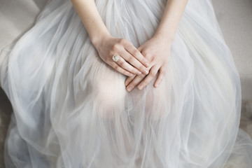 A bride's morning and beautiful ring and dress