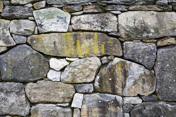 stone fence. Stone wall texture. Old rock blocks 