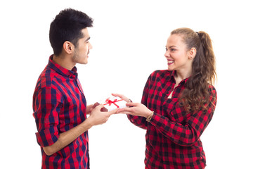 Young couple holding a present 