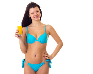 Naklejka premium Woman in swimming suit holding cocktail