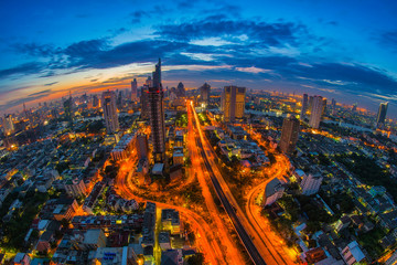 Fototapeta na wymiar Aerial view of cityscape at twilight, Bangkok, Thailand. The Bangkok view in business district.