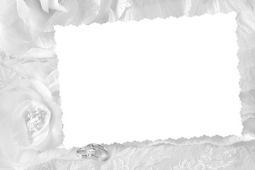 Wedding rings on wedding card, on a white wedding dress