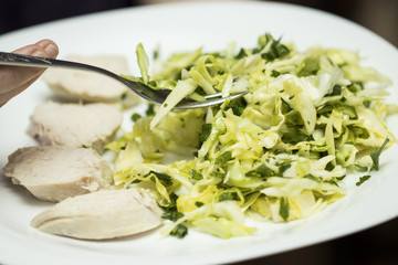 Healthy food - chicken fillet with vegetables on the plate