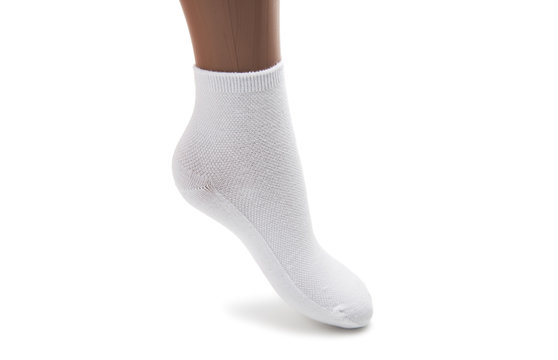 White sock on a mannequin isolated