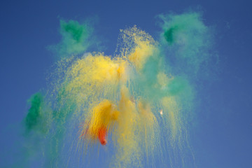Day fireworks made of colored smoke. Holidays