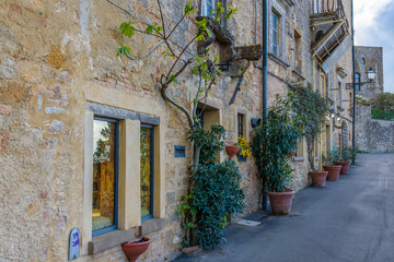Fototapeta na wymiar View of a street of the small and famous town of Volterra, Italy.