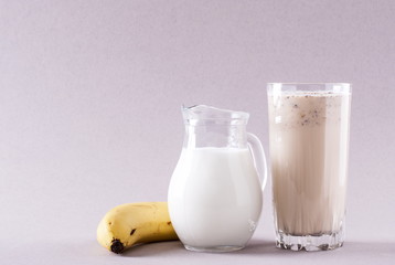 banana chocolate smoothie on a solid background