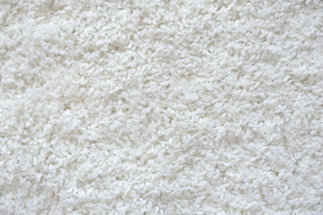 Beautiful texture of a white carpet